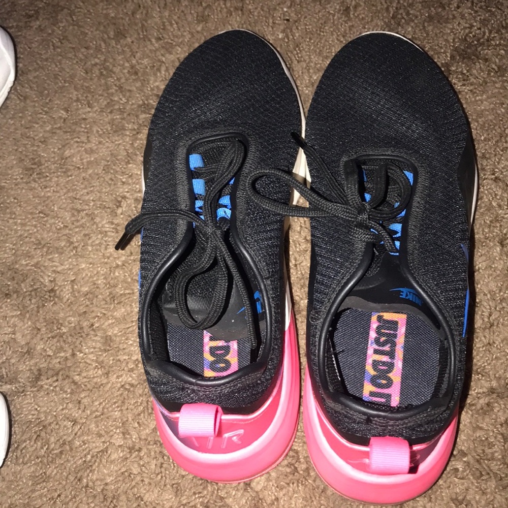 Pink, blue, and black Nike shoes
